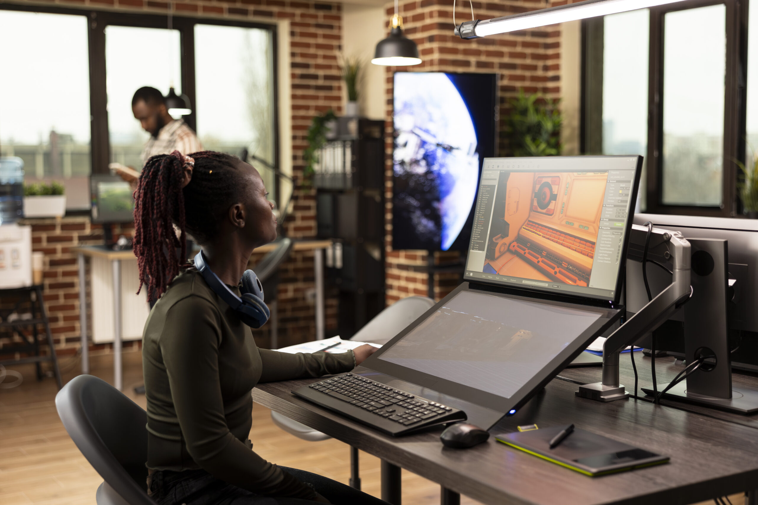 black woman analyzing edited videos
